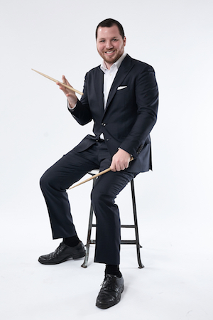 Alex Raderman drummer with his drumsticks